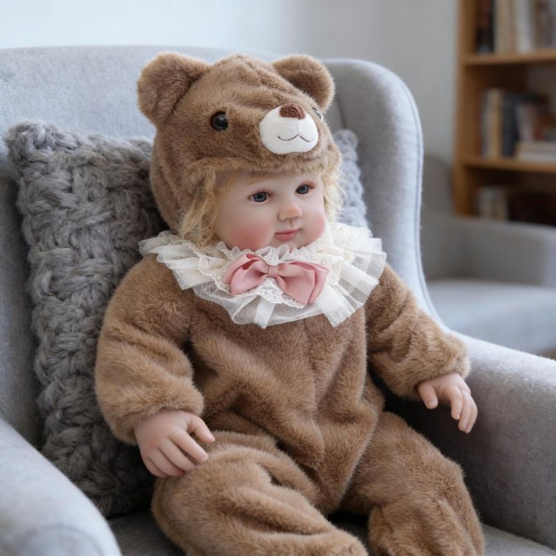 28-Inch Realistic Vinyl Baby Doll in Brown Plush Bear Suit – Hand-Painted Collectible with Blue Acrylic Eyes