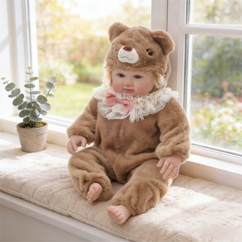28-Inch Realistic Vinyl Baby Doll in Brown Plush Bear Suit – Hand-Painted Collectible with Blue Acrylic Eyes